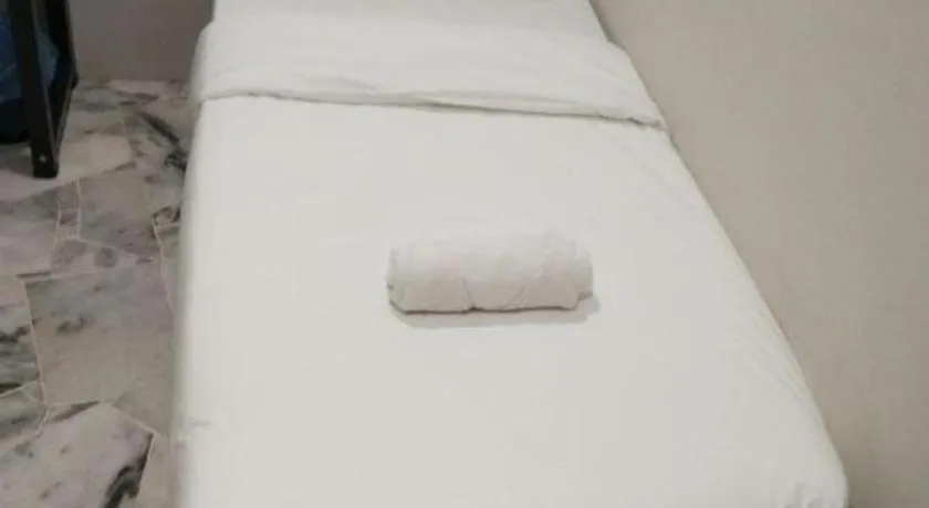 Bed in OYO 89874 Gs Golden Star Hotel