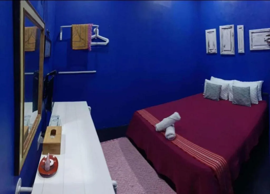 Bed in Oyasumi Hotel