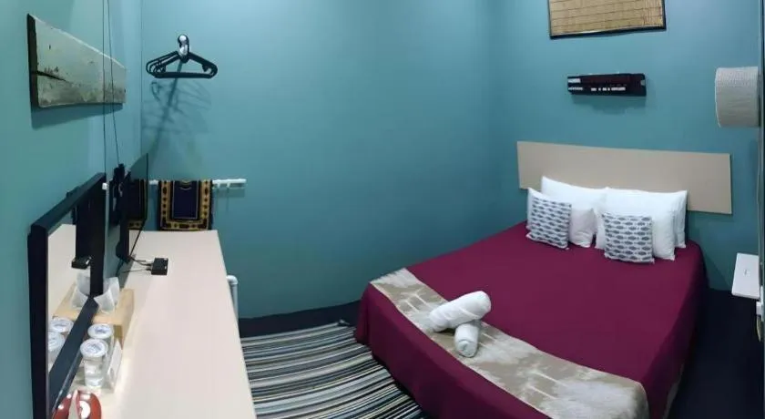 Bed in Oyasumi Hotel