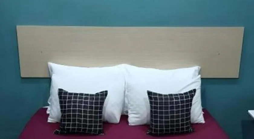 Bed in Oyasumi Hotel