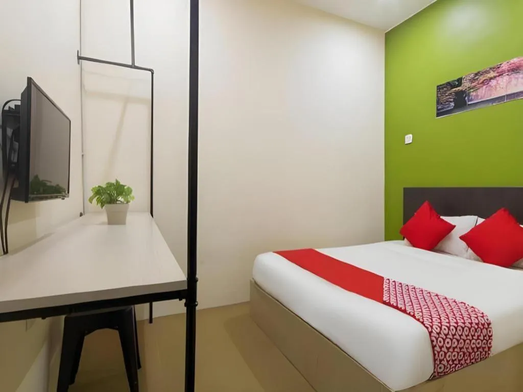 Bed in Oyasumi Hotel