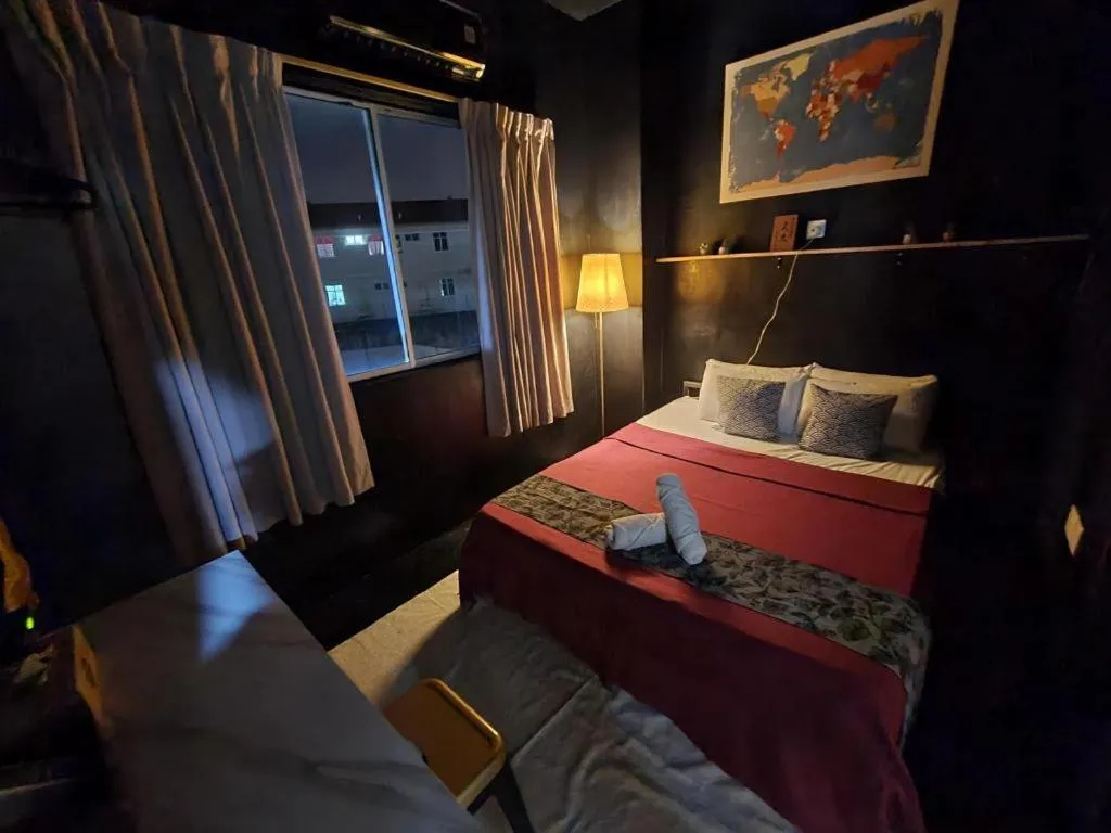 Bed in Oyasumi Hotel