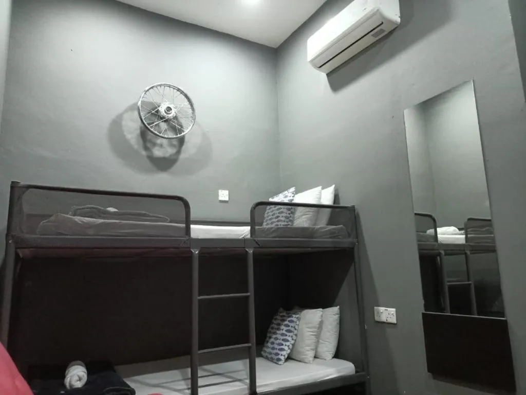 Bed in Oyasumi Hotel