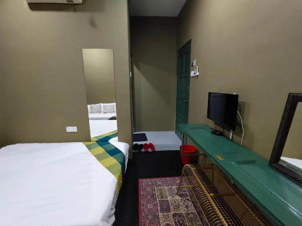 Bed in Oyasumi Hotel