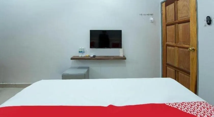 Bed in OYO 90234 Sungai Rengit City Resort 2