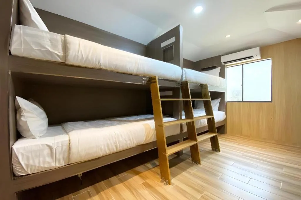 Bed in OYO 90262 Kota Kinabalu Homestay, Villa & Suite Boutique