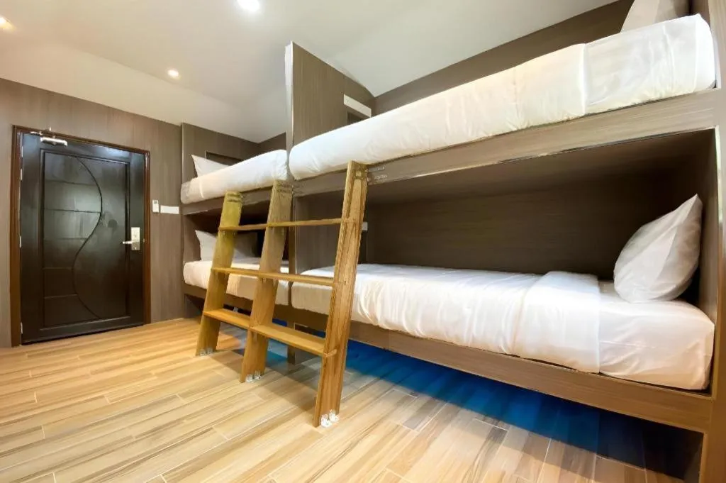 Bed in OYO 90262 Kota Kinabalu Homestay, Villa & Suite Boutique