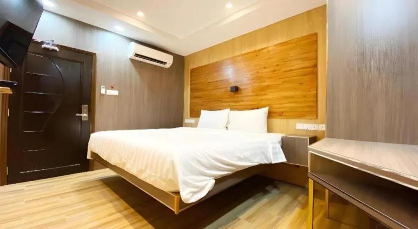 Bed in OYO 90262 Kota Kinabalu Homestay, Villa & Suite Boutique