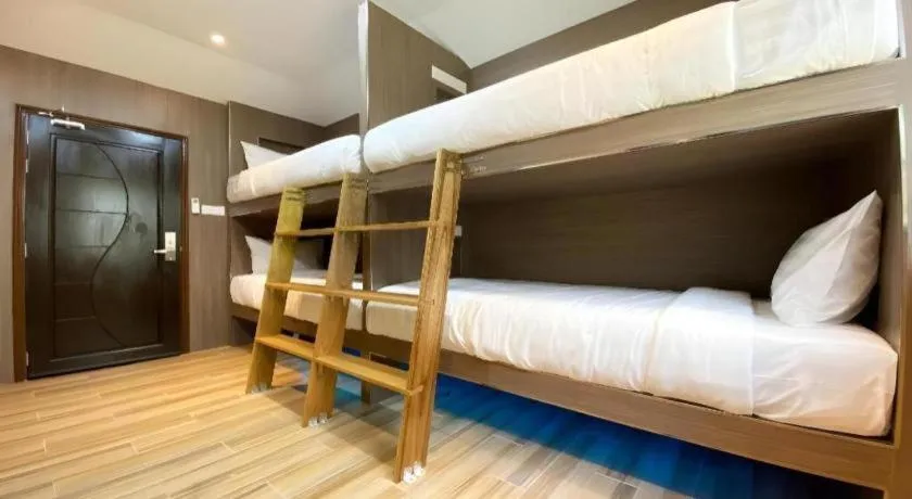 Bed in OYO 90262 Kota Kinabalu Homestay, Villa & Suite Boutique