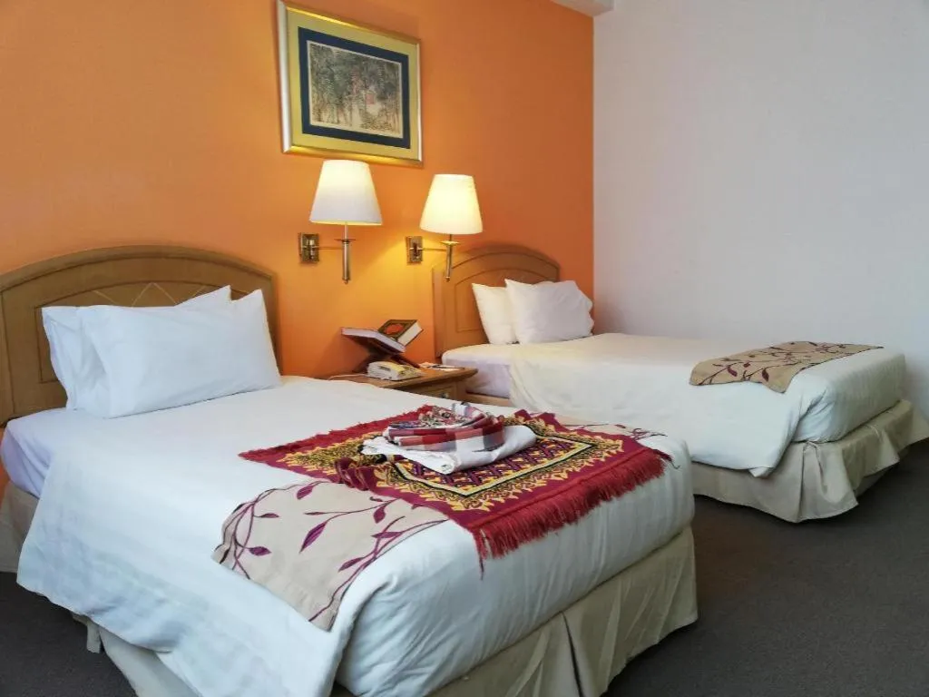 Bed in Grand Barakah Hotel