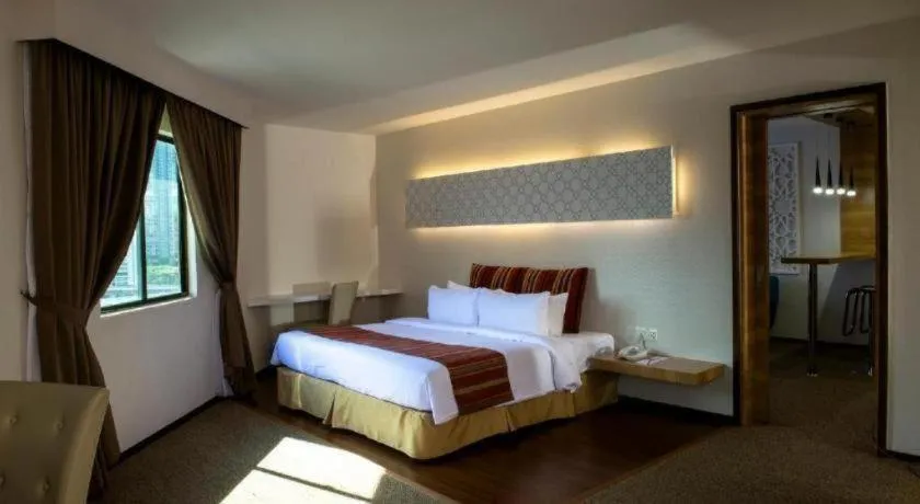 Bed in Grand Barakah Hotel