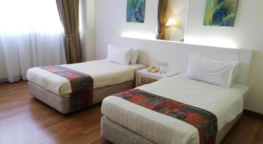 Bed in Grand Barakah Hotel