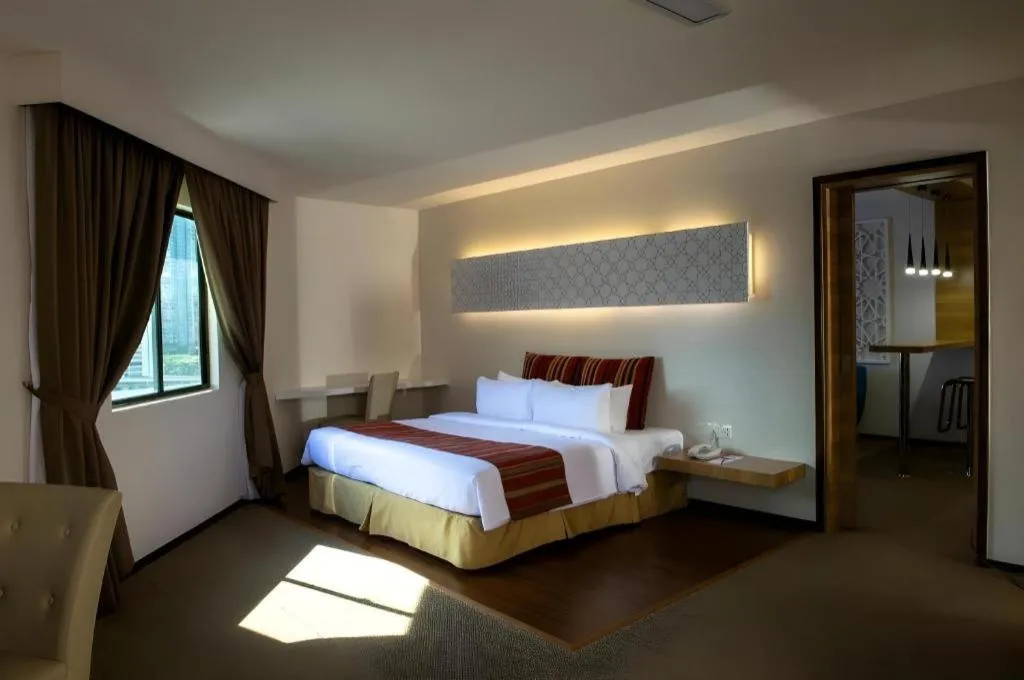 Bed in Grand Barakah Hotel