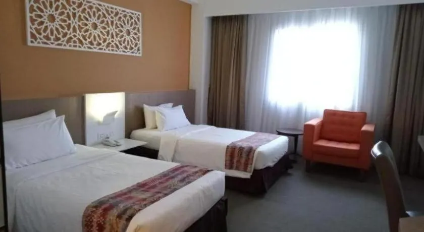 Bed in Grand Barakah Hotel