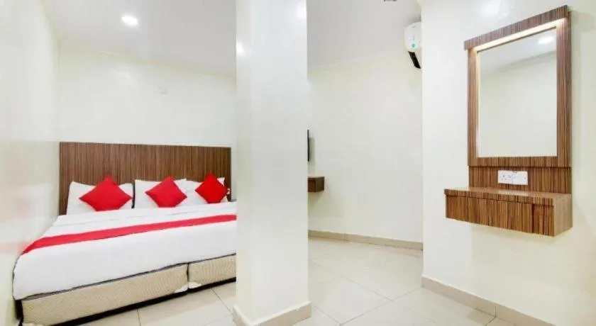 Bed in OYO 90623 Thank Q Inn 3