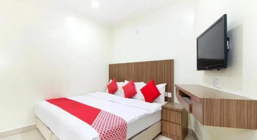 Bed in OYO 90623 Thank Q Inn 3