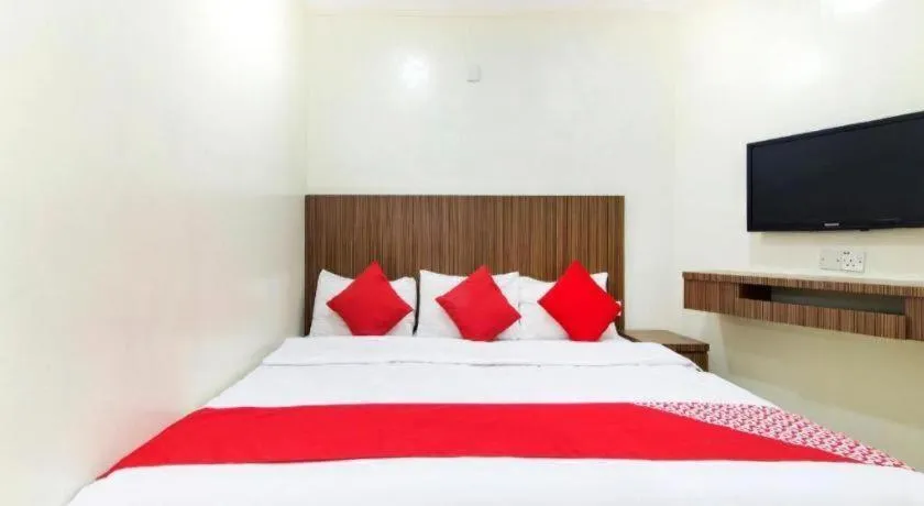 Bed in OYO 90623 Thank Q Inn 3