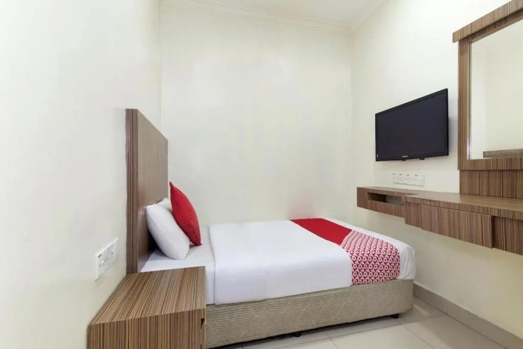 Bed in OYO 90623 Thank Q Inn 3