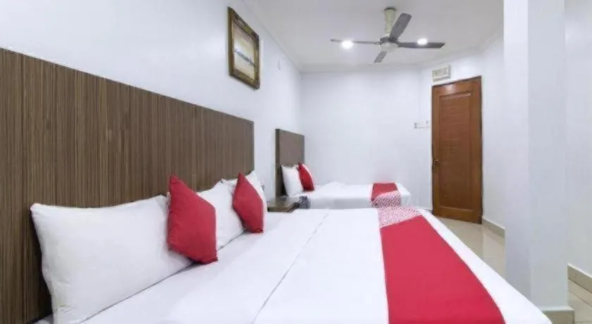 Bed in OYO 90623 Thank Q Inn 3