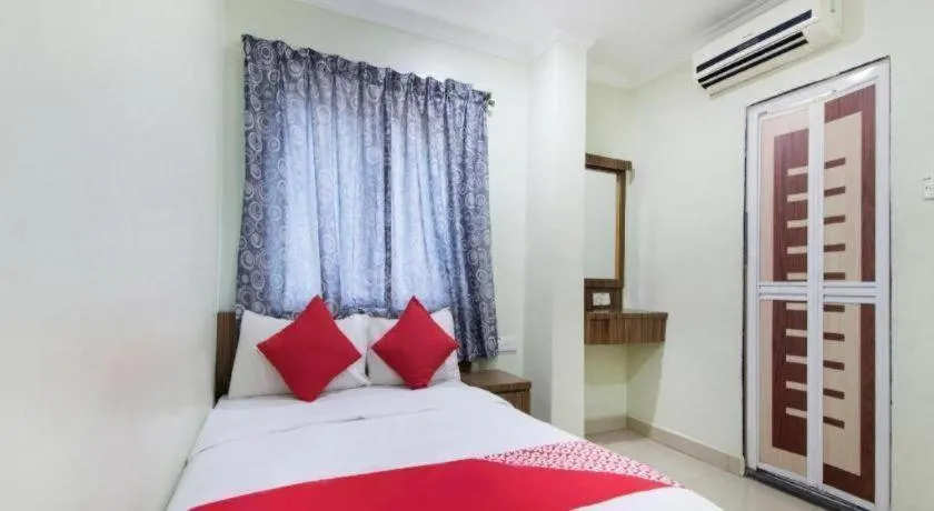 Bed in OYO 90623 Thank Q Inn 3