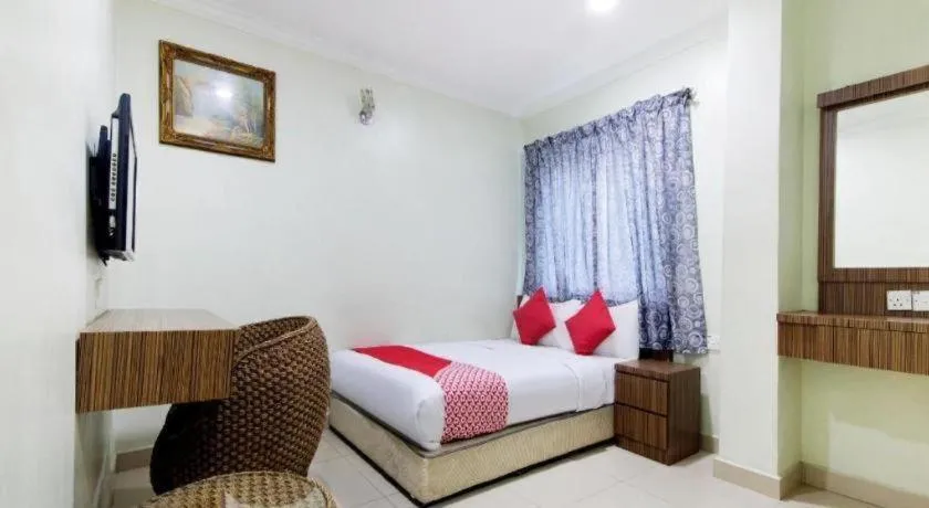 Bed in OYO 90623 Thank Q Inn 3