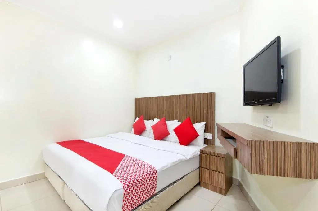 Bed in OYO 90623 Thank Q Inn 3