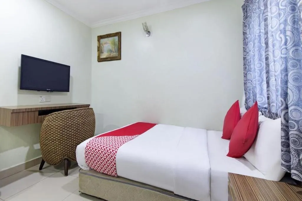 Bed in OYO 90623 Thank Q Inn 3