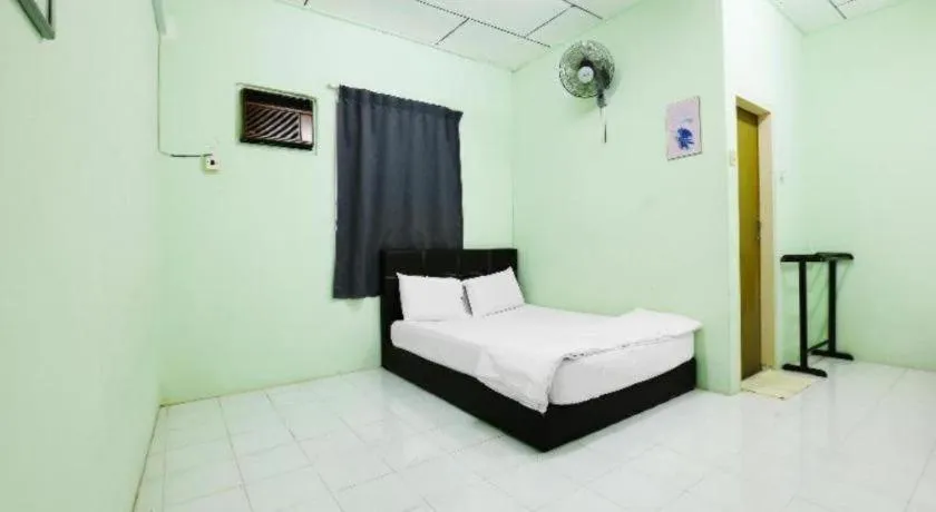 Bed in OYO 90623 Thank Q Inn 3