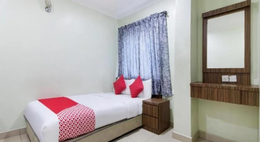 Bed in OYO 90623 Thank Q Inn 3