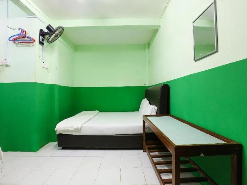 Bed in OYO 90623 Thank Q Inn 3