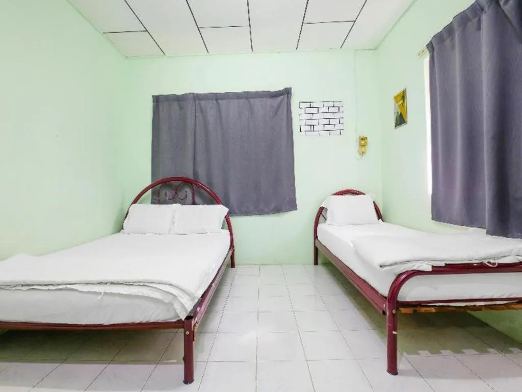 Bed in OYO 90623 Thank Q Inn 3