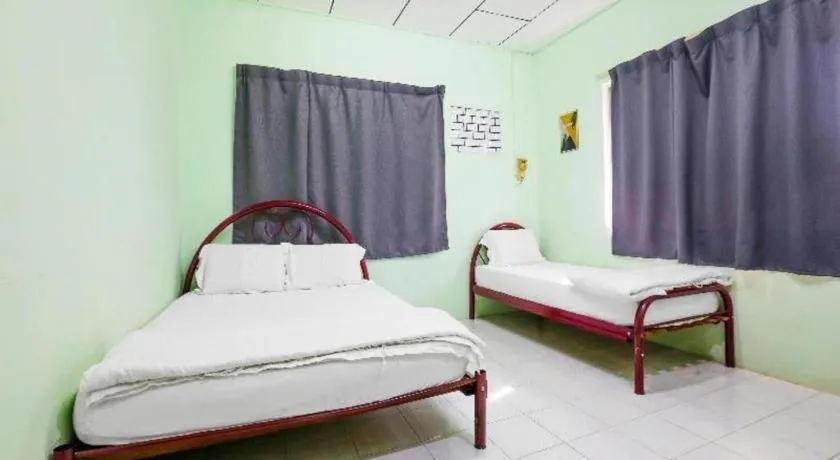 Bed in OYO 90623 Thank Q Inn 3