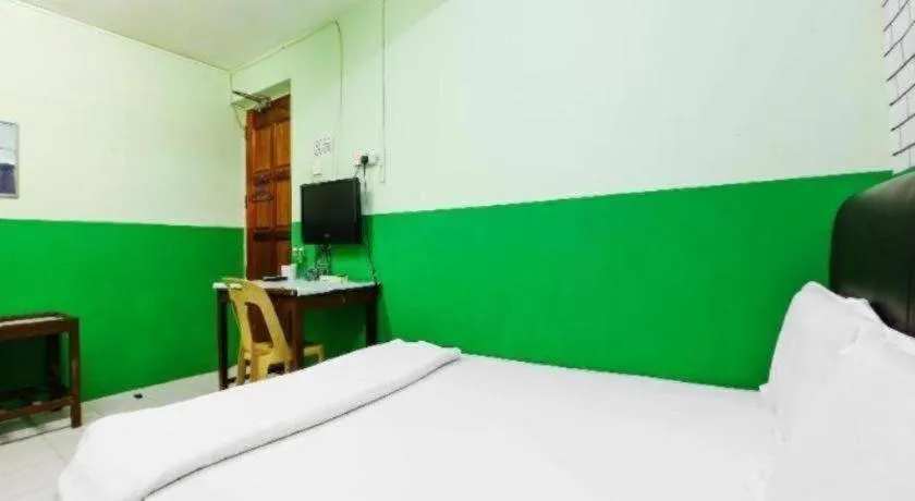 Bed in OYO 90623 Thank Q Inn 3