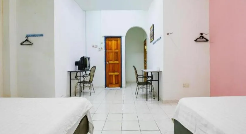 Bed in OYO 90623 Thank Q Inn 3