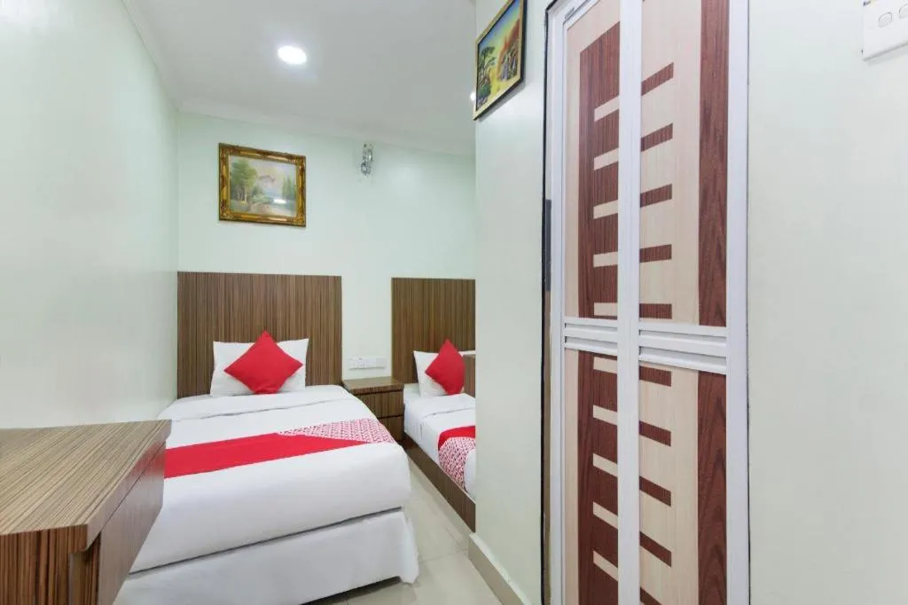 Bed in OYO 90623 Thank Q Inn 3