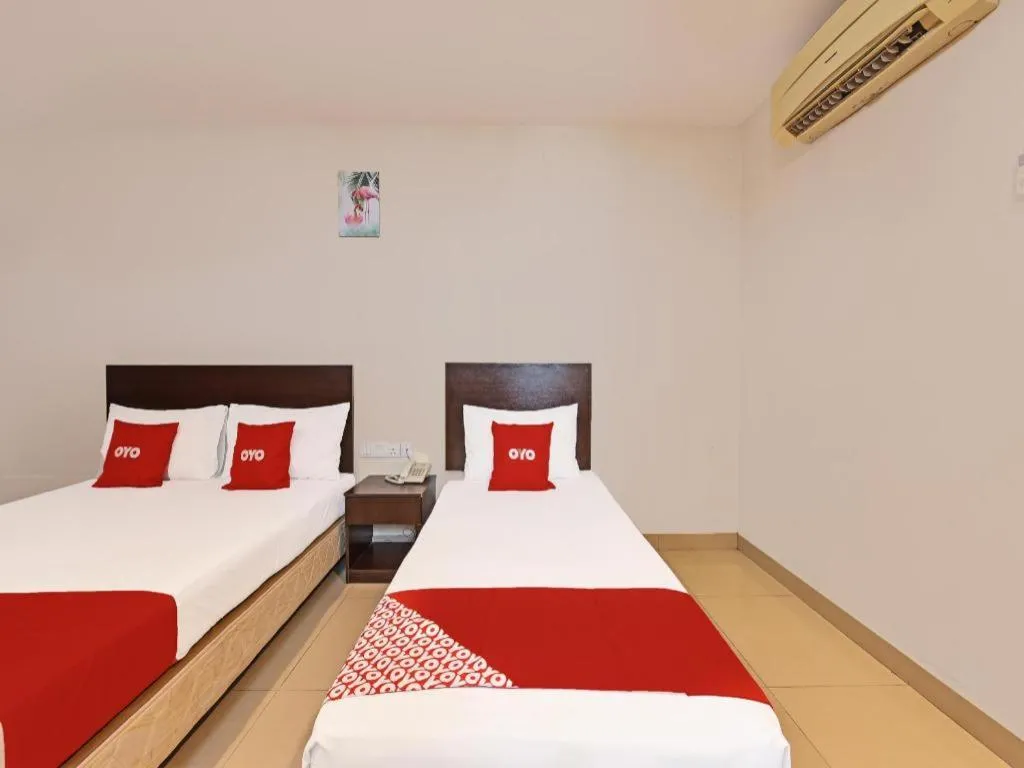 Bed in OYO 90669 My Hotel Vistana