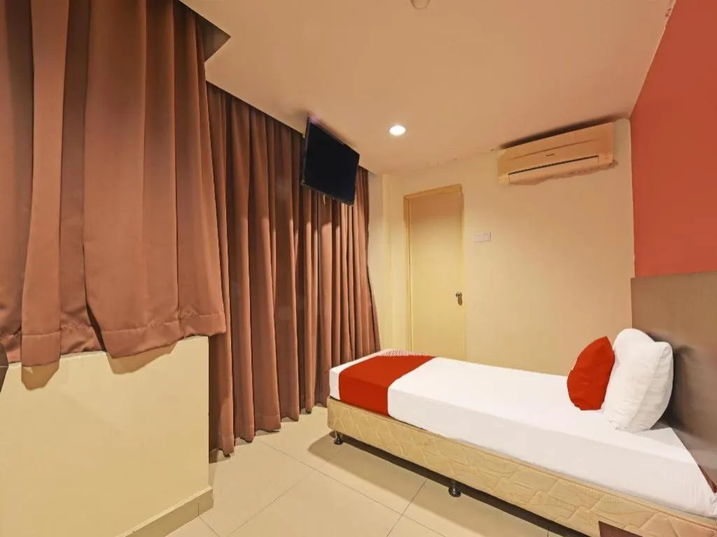 Bed in OYO 90669 My Hotel Vistana