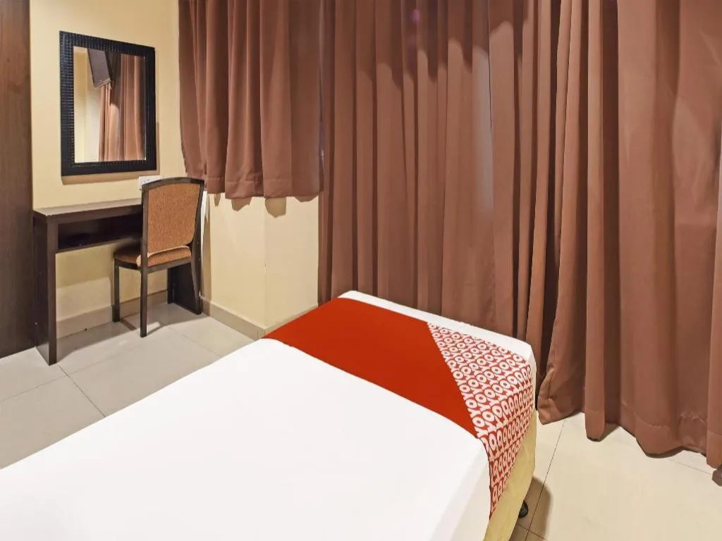 Bed in OYO 90669 My Hotel Vistana