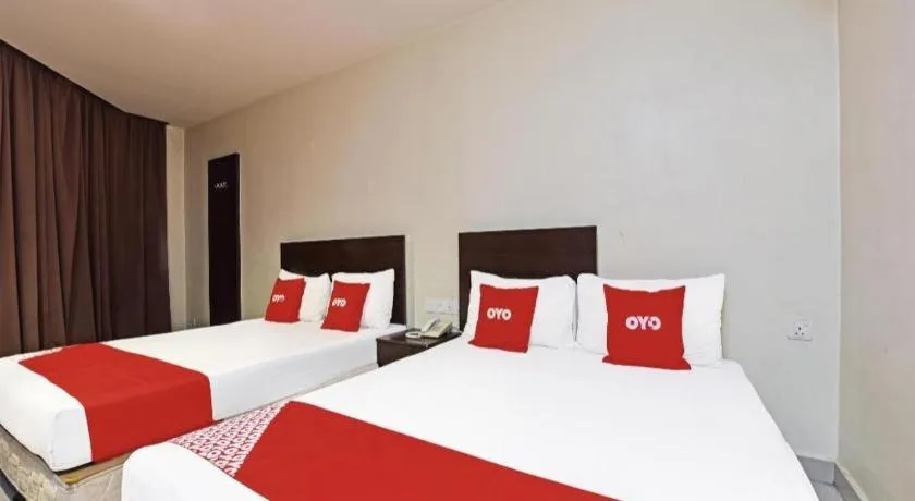 Bed in OYO 90669 My Hotel Vistana
