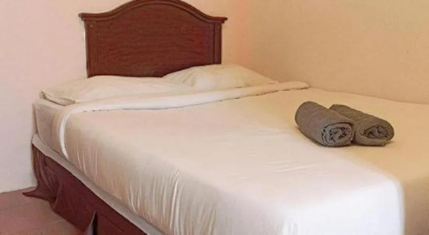 Bed in The Hotel Tudor Inn