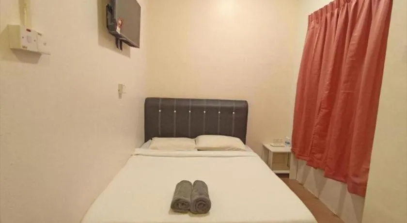 Bed in The Hotel Tudor Inn