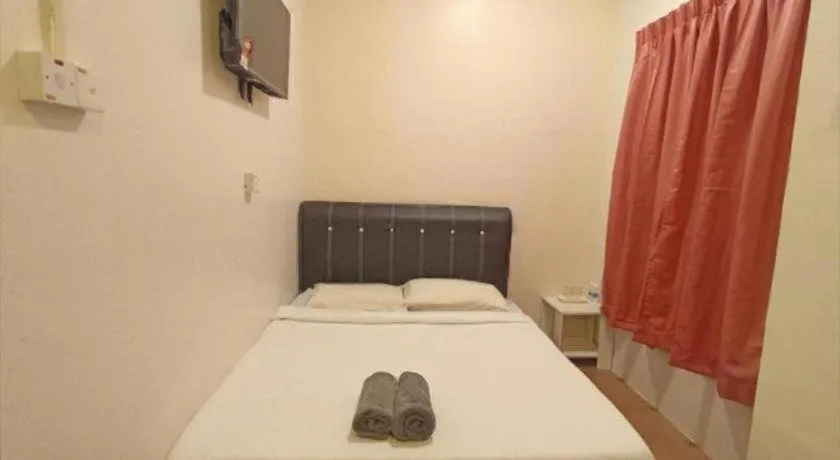 Bed in The Hotel Tudor Inn