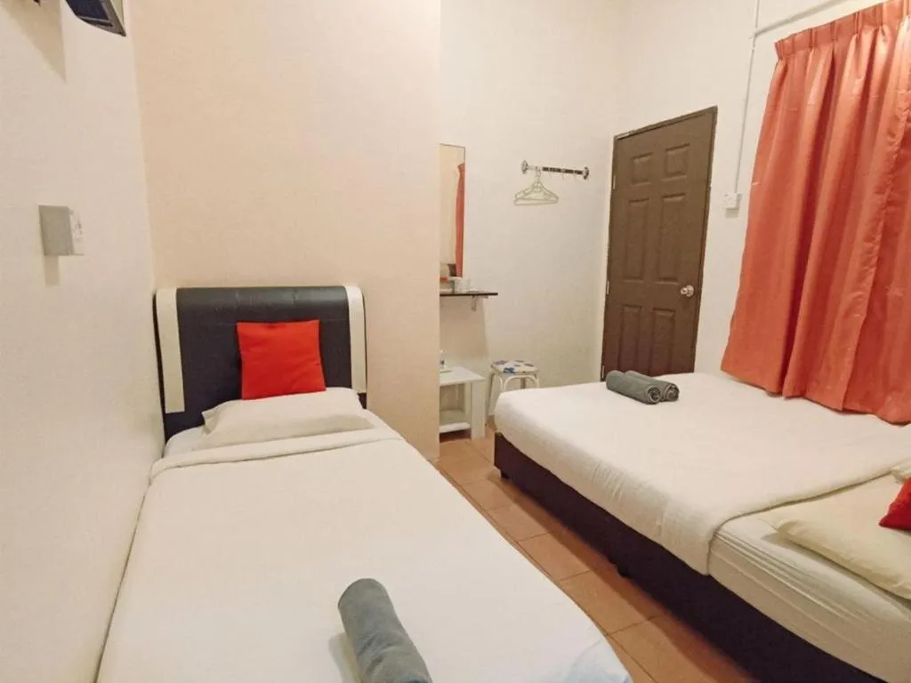 Bed in The Hotel Tudor Inn