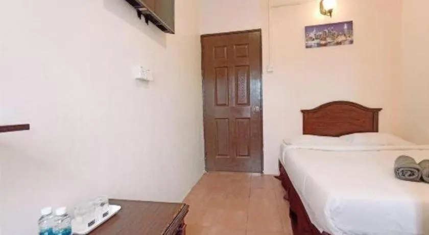 Bed in The Hotel Tudor Inn