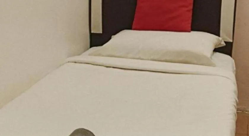 Bed in The Hotel Tudor Inn