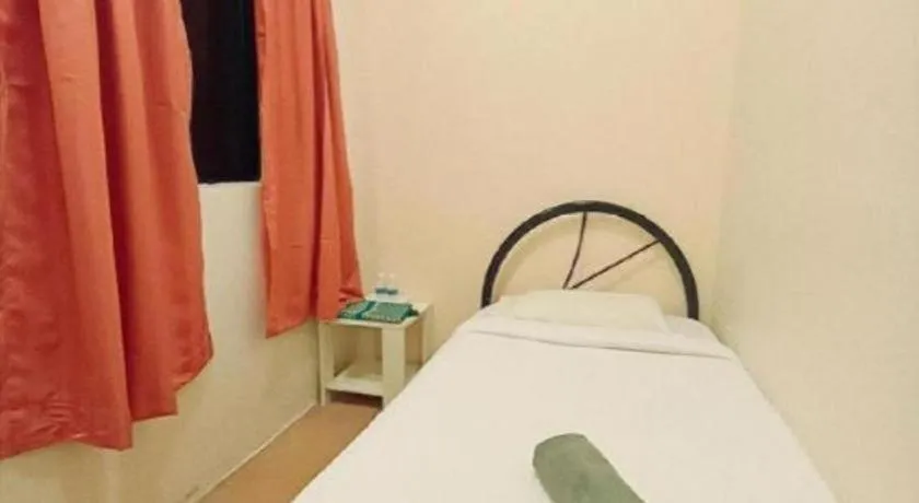 Bed in The Hotel Tudor Inn