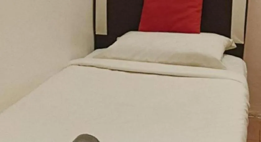 Bed in The Hotel Tudor Inn