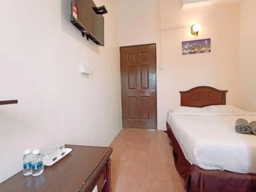 Bed in The Hotel Tudor Inn