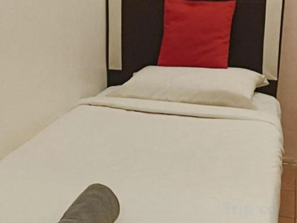 Bed in The Hotel Tudor Inn