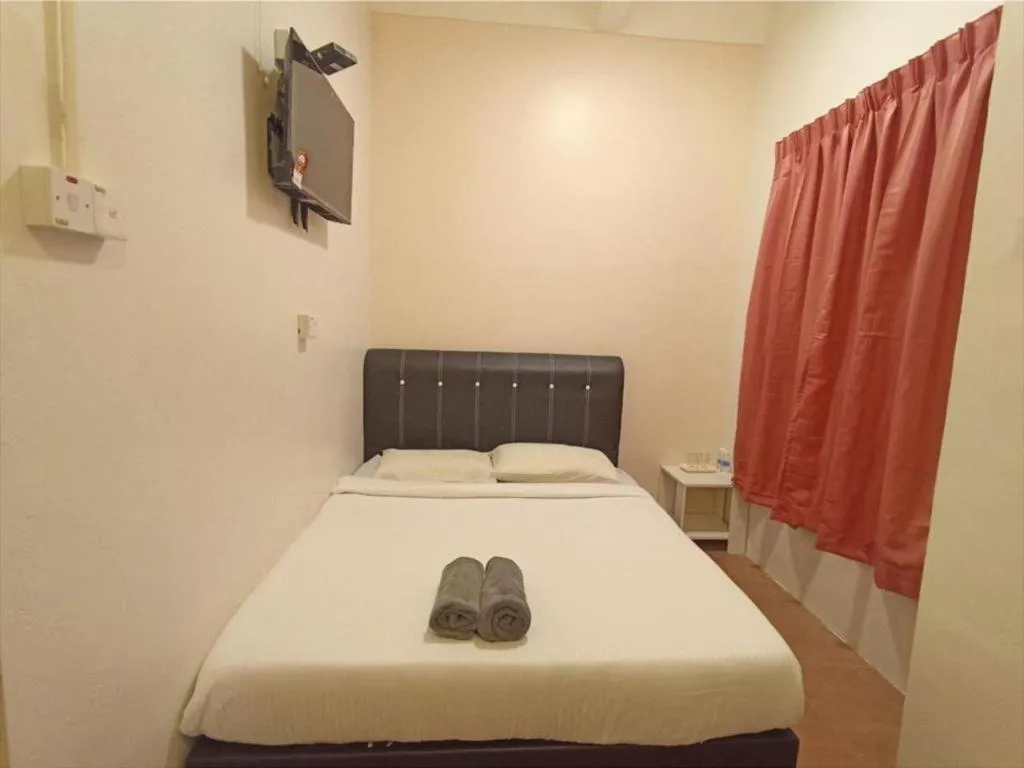 Bed in The Hotel Tudor Inn